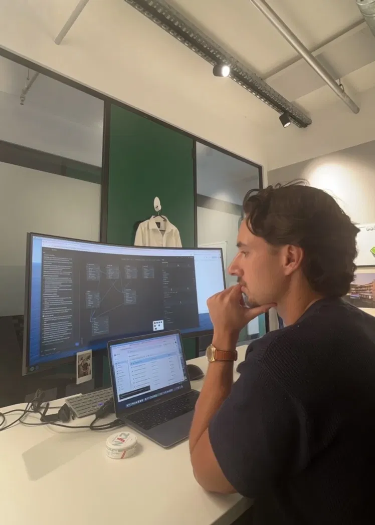 Jack at his desk, working on a client build.